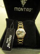 Montag ladies swiss 22kt gold plated watch, not ticking but looks unused in original box