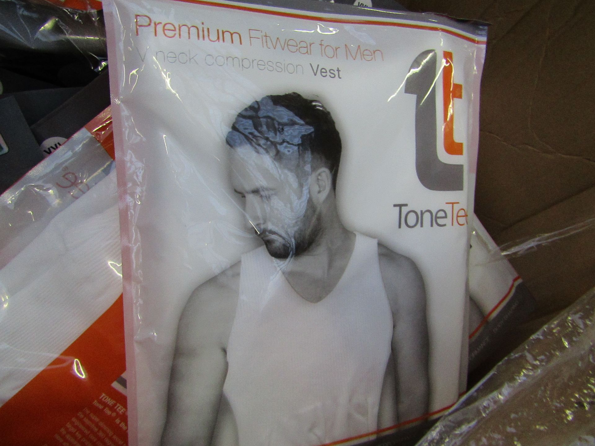 | 1X | PALLET OF APPROX 390 TONE TEE COMPRESSION tops, NEW IN PACKAGING SIZE XL, PALLET MAY