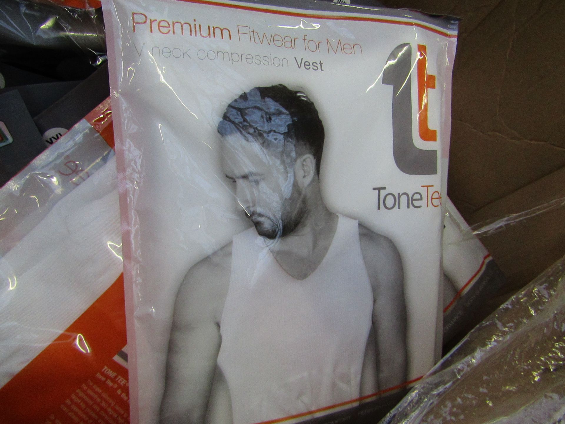 | 1X | PALLET OF APPROX 390 TONE TEE COMPRESSION tops, NEW IN PACKAGING SIZE XL, PALLET MAY