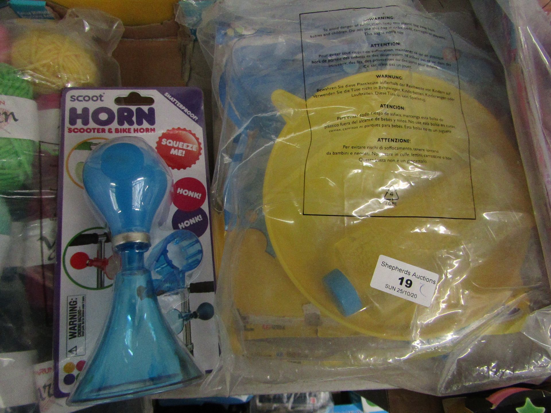 2 Items Being a Scoot Horn & an Amazing giant Bubbles Wand & Solution. Both packaged