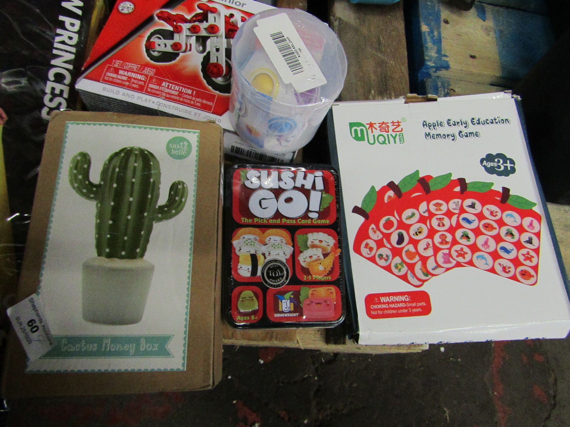 4 Items Being a Sushi Go Card Game (new), Cactus money Box, Magic Cube Ball & an Apple Early
