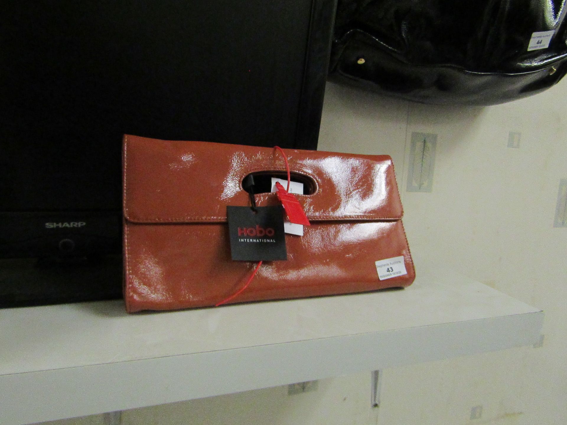 Hobo international Katrina Clay Core clutch bag.