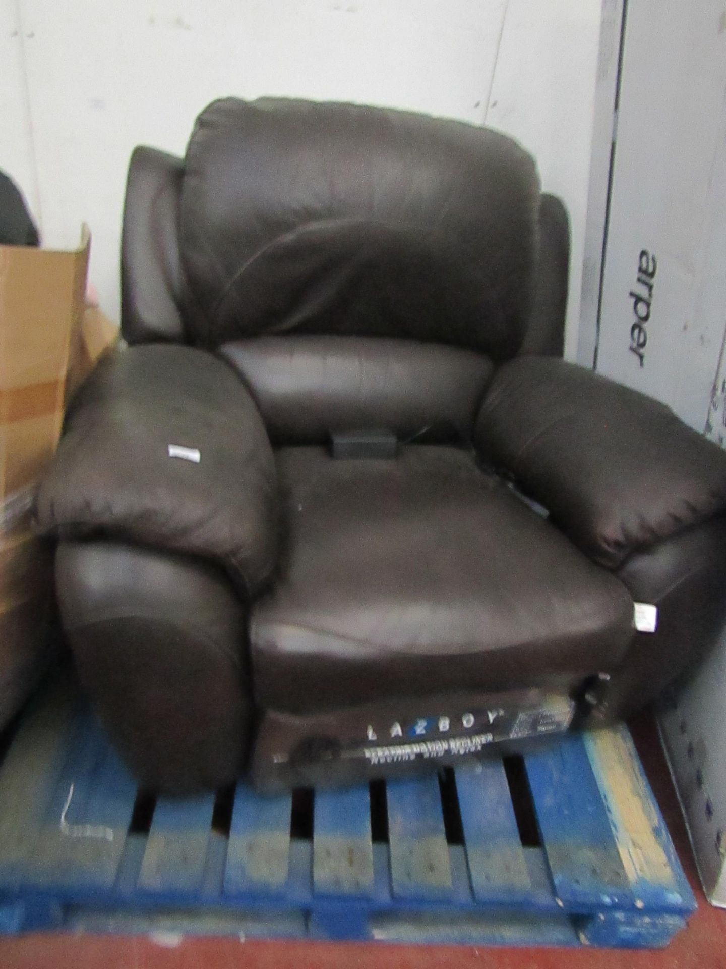 Costco leather power recliner arm chair, untested and has a few faded parts