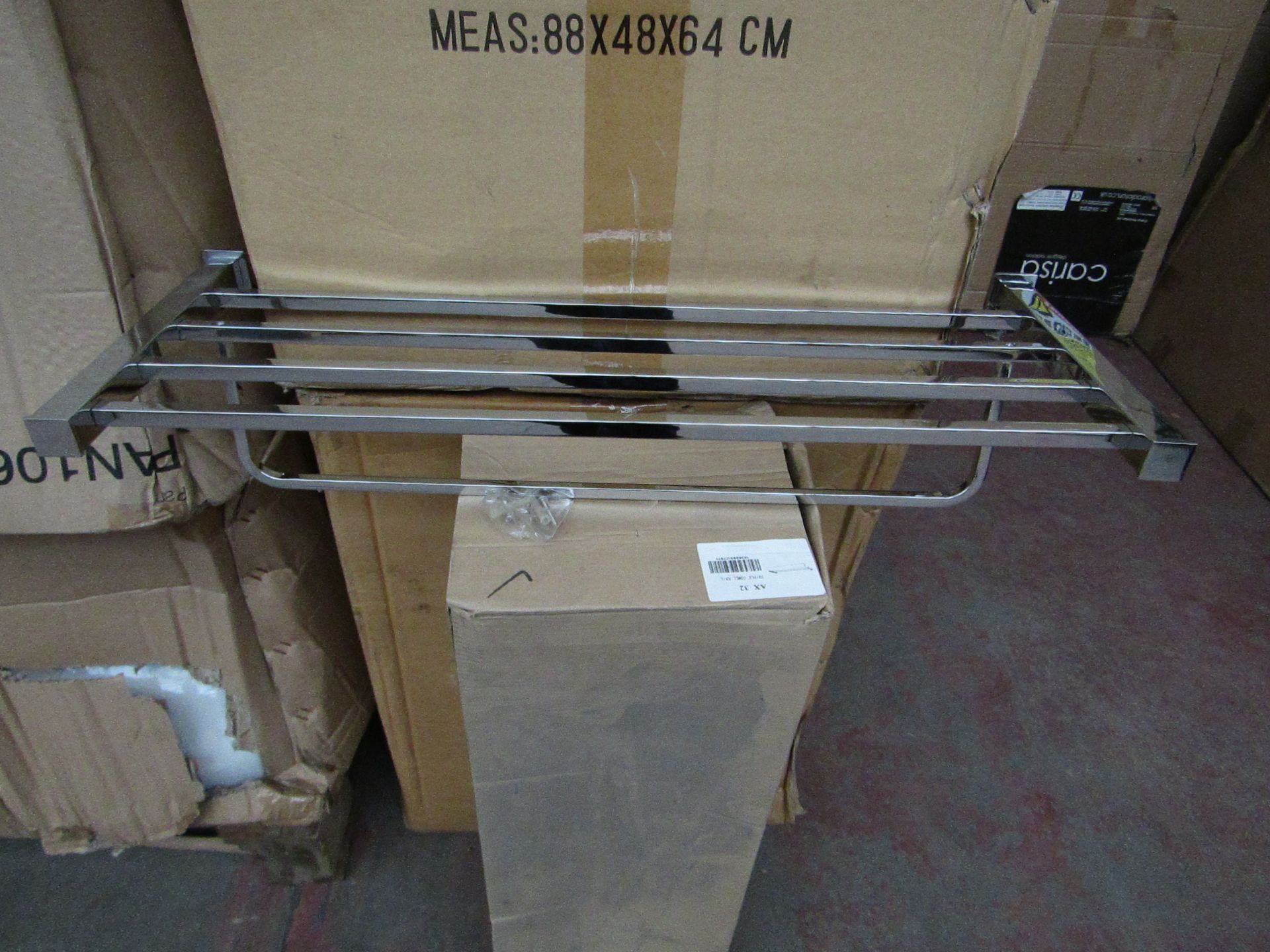 Triple towel rail in chrome, new and boxed.