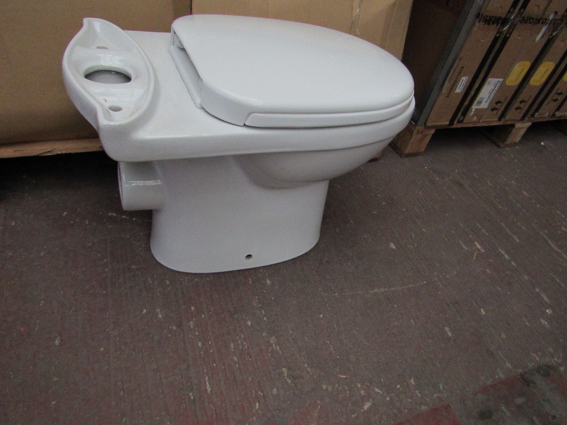 Olivia close coupled toilet pan with seat cover TA-001, new and boxed.