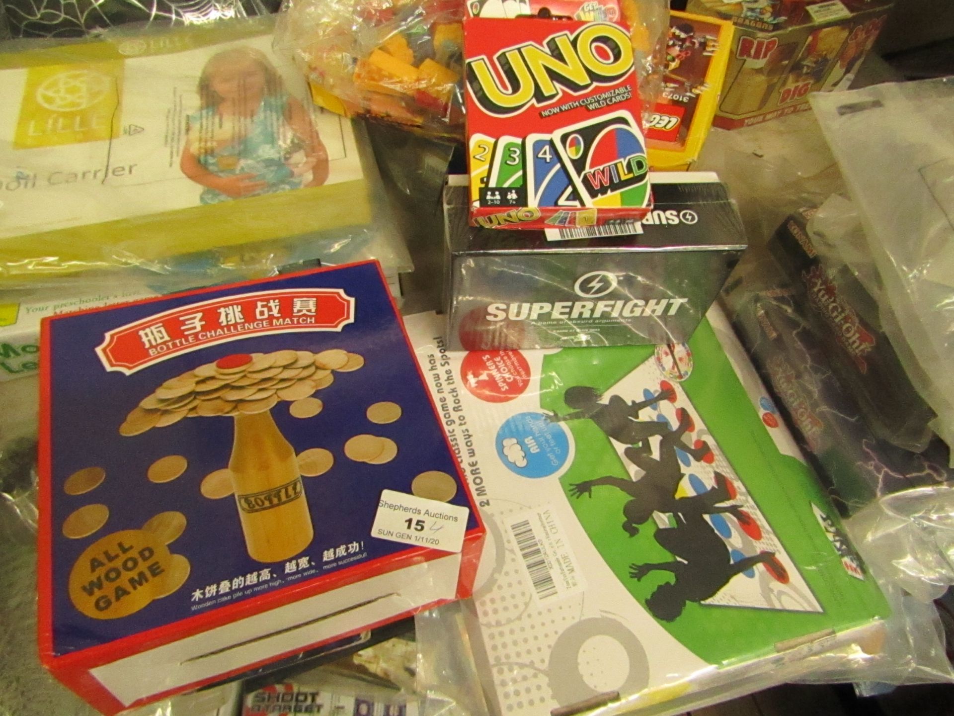 4 Items Being a UNO Card Game,Superfight Game,Bottle Challenge Match & a Twister Style Game.