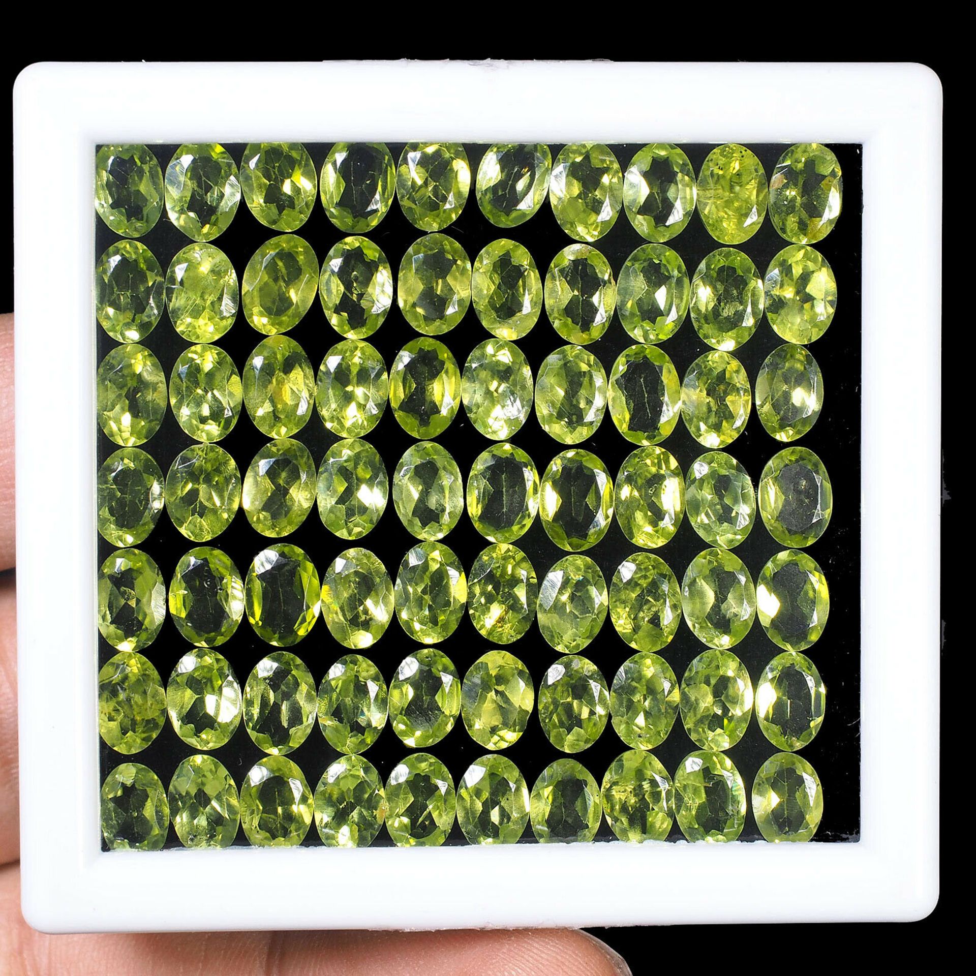 Natural Peridot - 52.40 carats - 70 pieces - average retail value £25,920.81