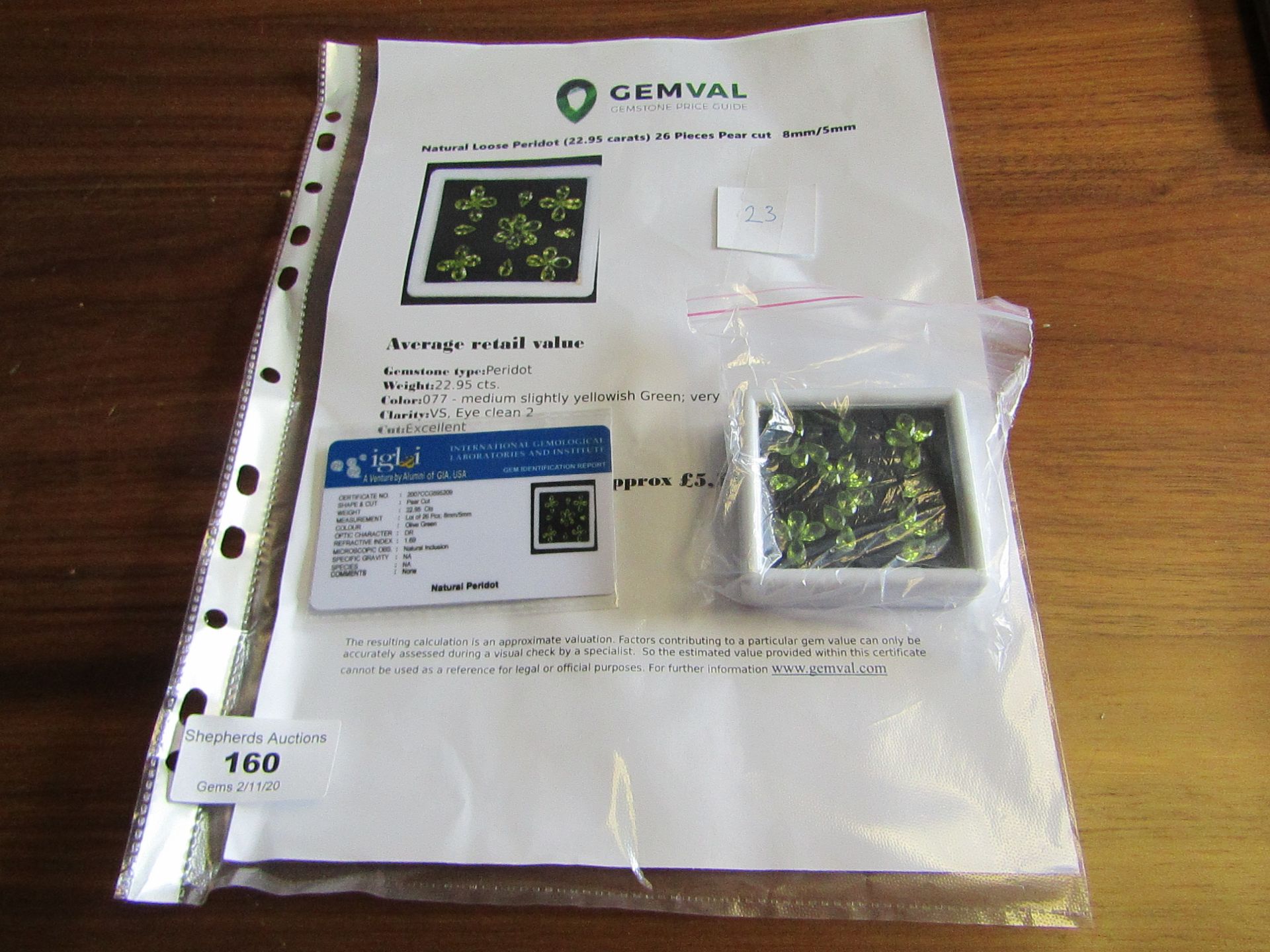 Natural Peridot - 22.95 carats - 26 pieces - average retail value £ 5,581.14 - Image 2 of 2