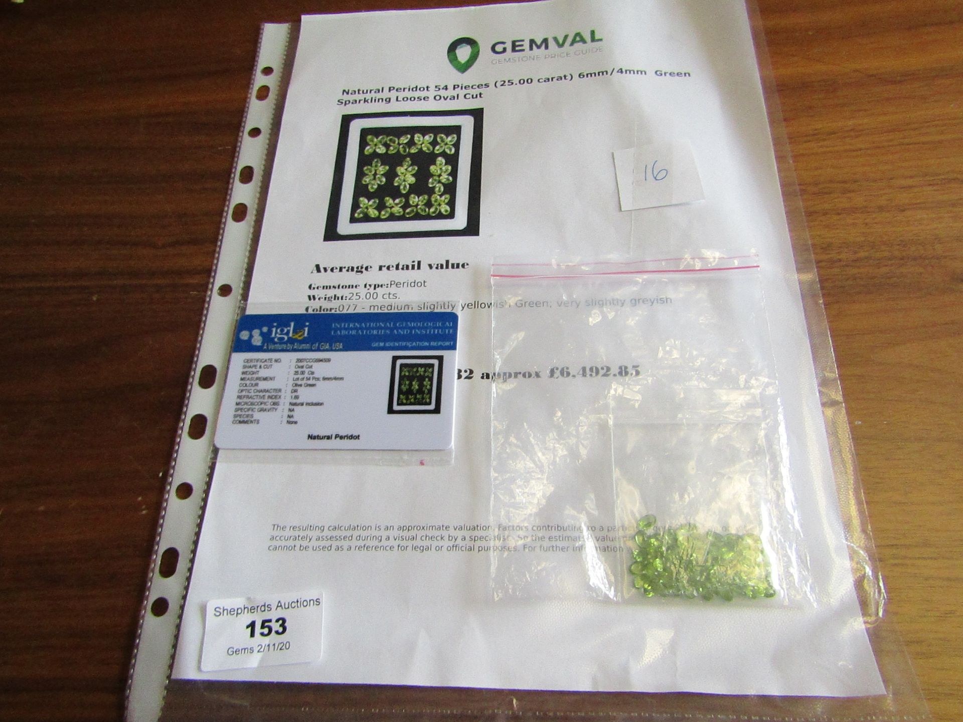 Natural Peridot - 25.00 carats - 54 pieces - Average retail value £6,492.85 - Image 2 of 2