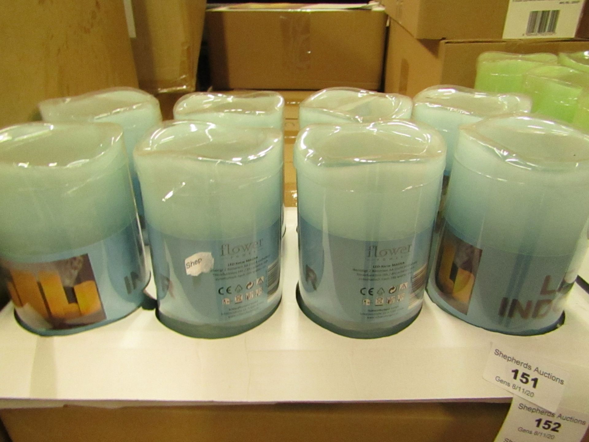 8 x Battery operated LED Candles. New & Boxed