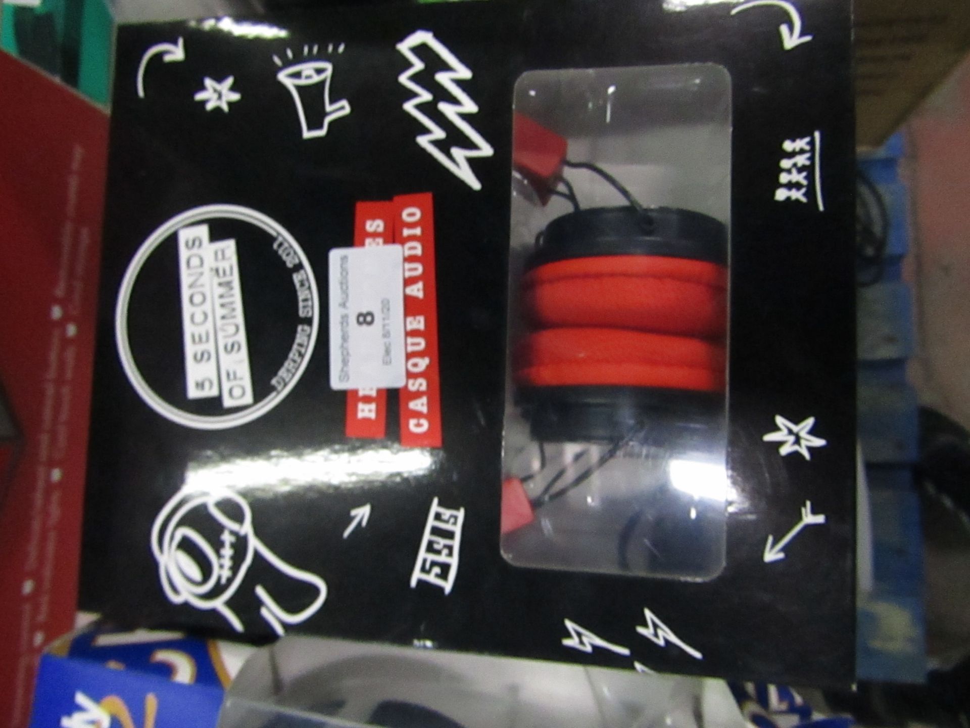 5 Seconds of Summer headphones, boxed and unchecked but looks to be still sealed
