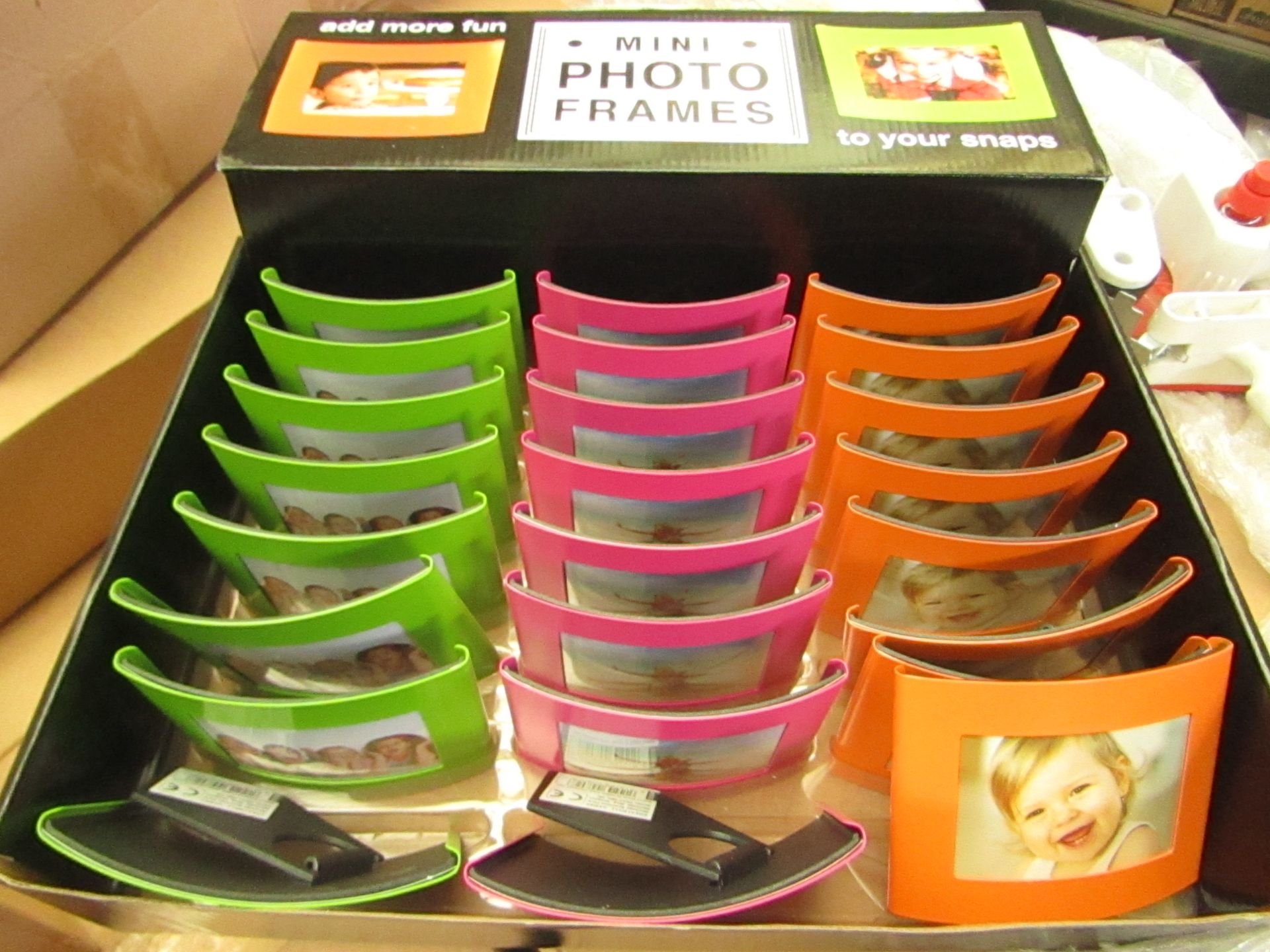 Box of 24 Mini Photo Frames. Comes in a retail Display Box - New & Boxed.