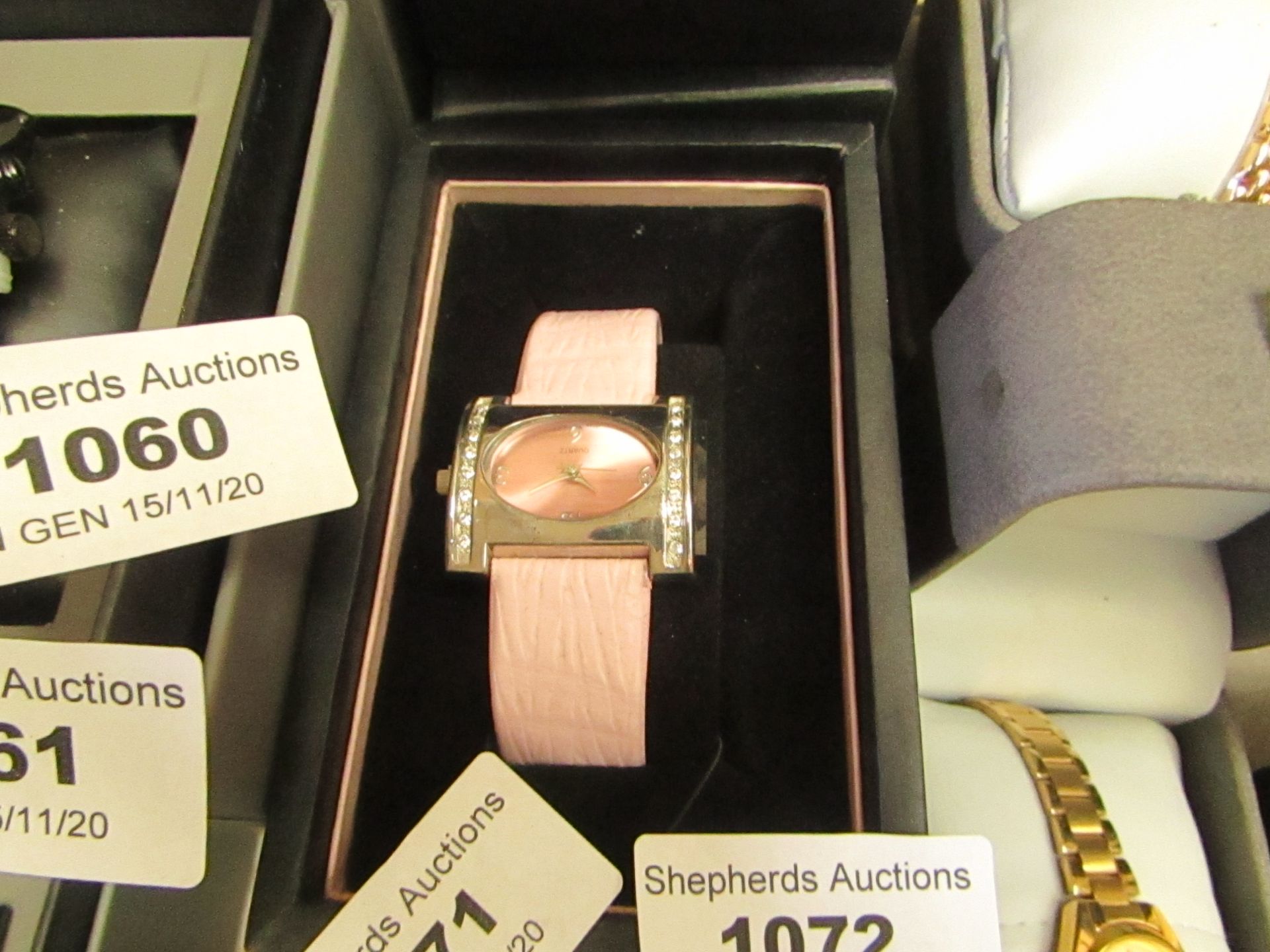 Ladies Pink Strapped watch, in box, unchecked for working condition