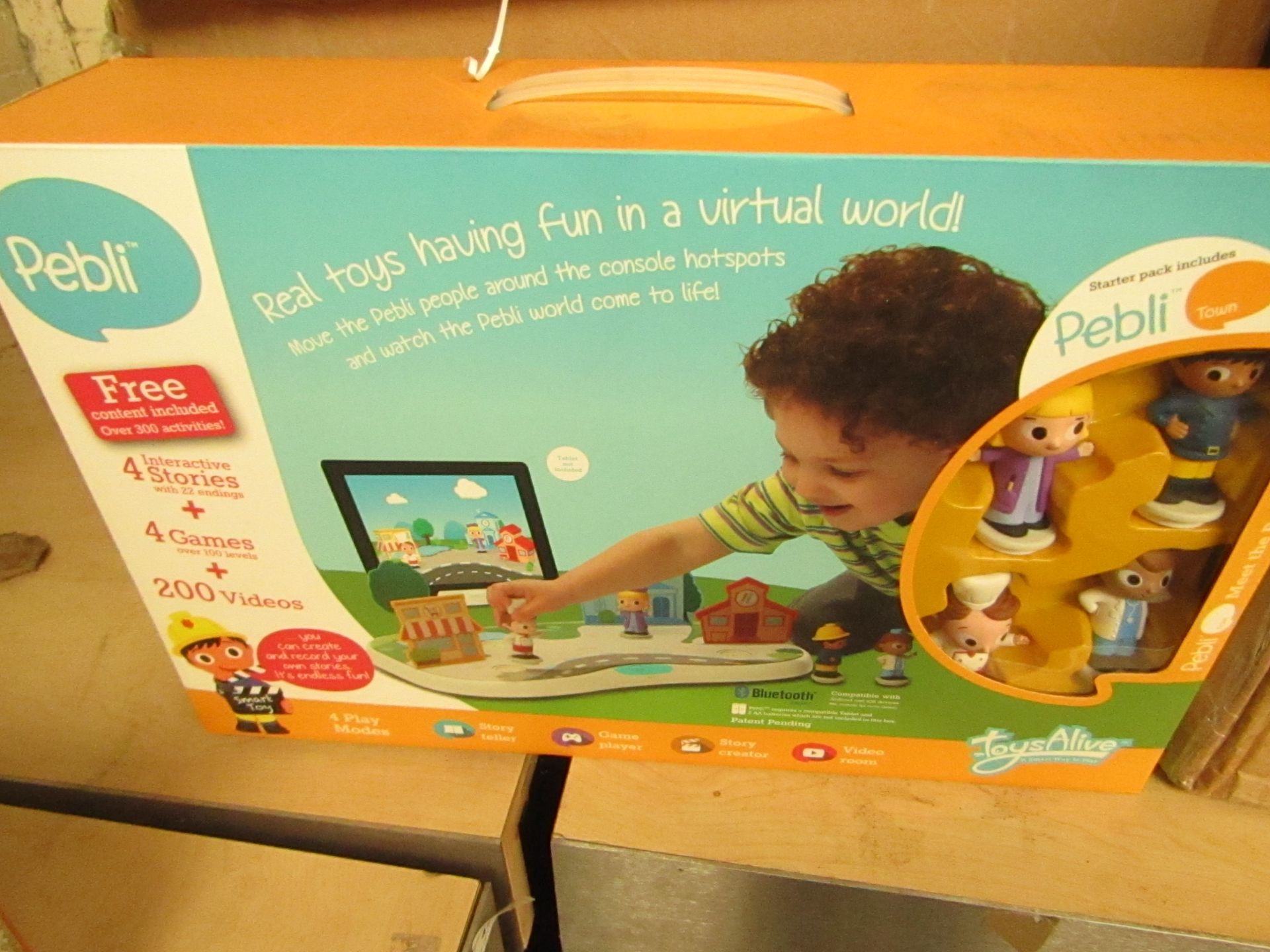 Toys alive Pebil Starter Pack includes smart bluetooth board and 4 characters, when set up it
