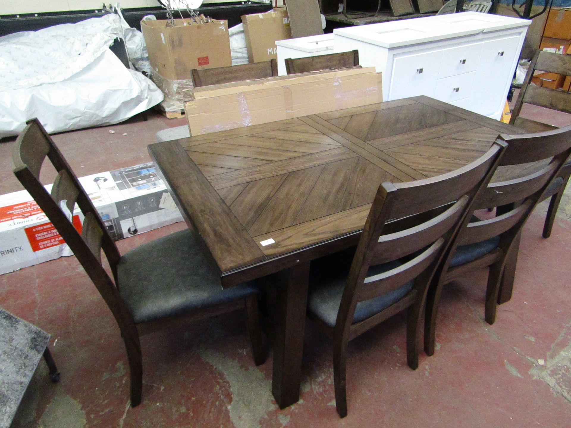 Whaslen 7 piece extending dining set, ex display, has a couple of scratches on the table top,