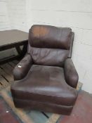 Costco Manual rocking reclining arm chair, working but has a discoloured patch on the head rest