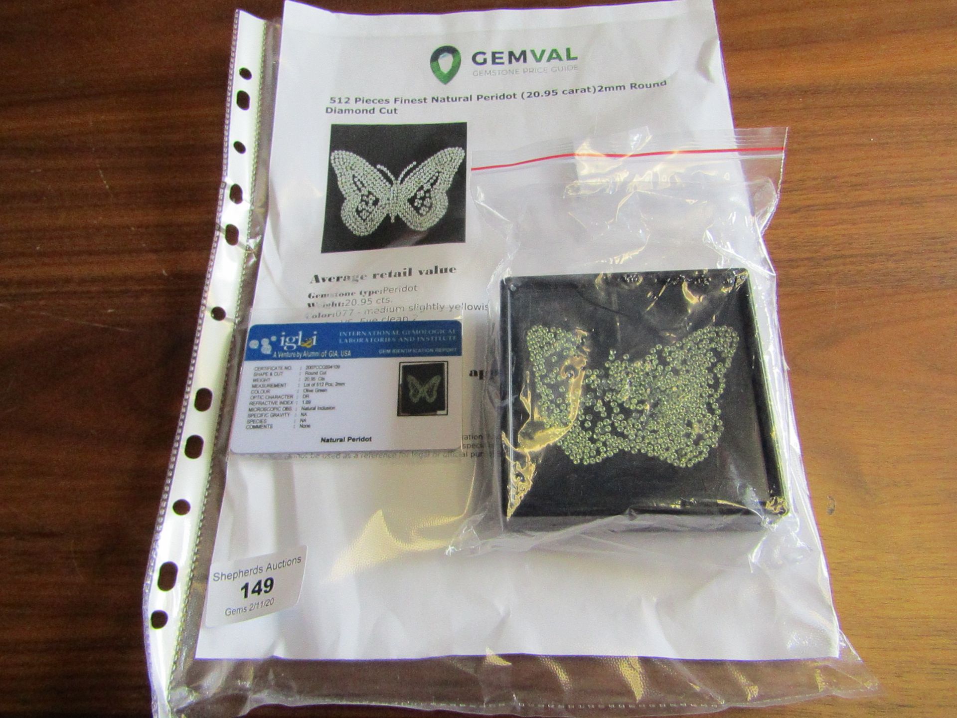 Natural Peridot - 20.95 Carats - 512 pieces - average retail value £ 4,713.44 - Image 2 of 2