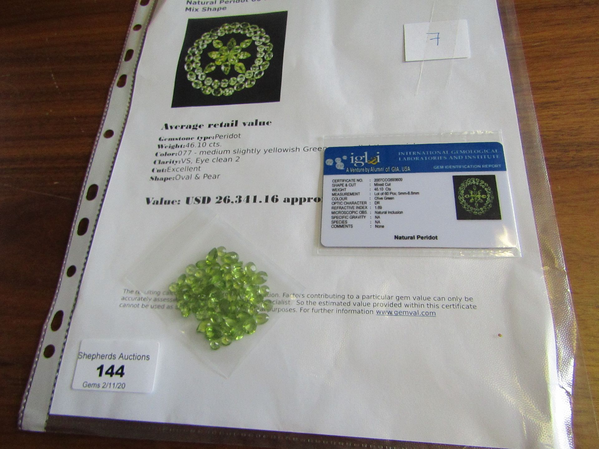 Natural peridot - 46.10 carats - 60 pieces - average retail value £20,313.91 - Image 2 of 2