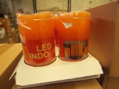 Box of 8 LED Battery operated Candles. New & Boxed. See Image For Colour