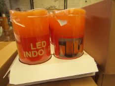 Box of 8 LED Battery operated Candles. New & Boxed. See Image For Colour