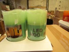 Box of 8 LED Battery operated Candles. New & Boxed. See Image For Colour