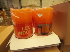 Box of 8 LED Battery operated Candles. New & Boxed. See Image For Colour