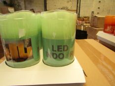 Box of 8 LED Battery operated Candles. New & Boxed. See Image For Colour