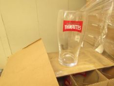 12 x Thwaites Pint Glasses. new & Boxed