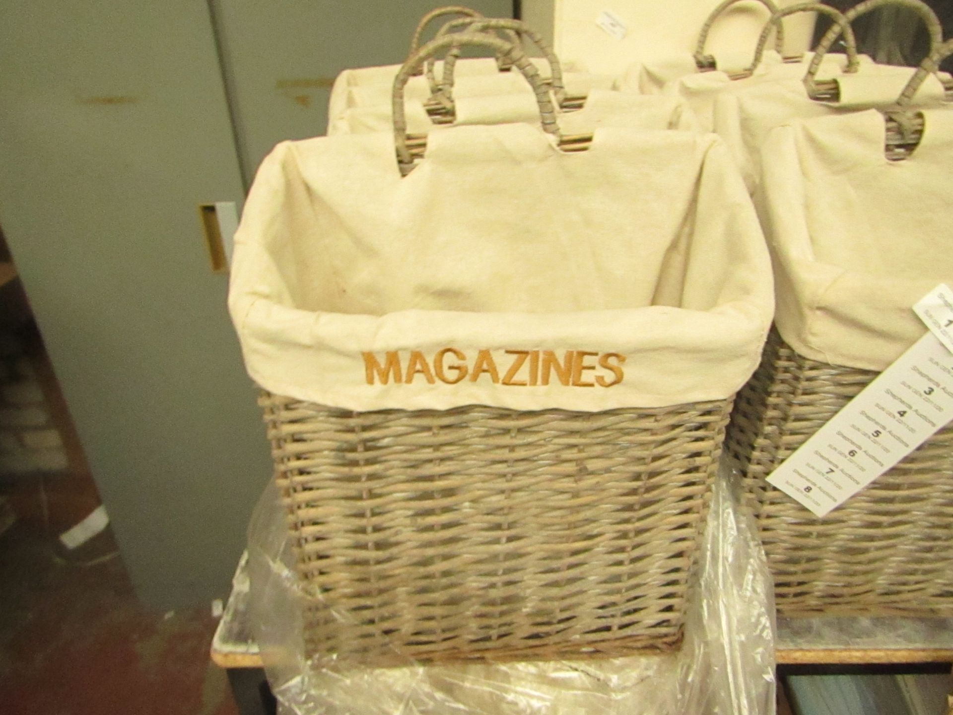 Grey Wicker Magazine Rack. Unused