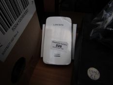 Linksys WiFi range extender, untested.