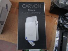 Carmen Chrome portable shave with USB charger, new and boxed.