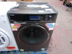 Sharp 1400RPM 10/6Kg washer dryer, powers on, heat untested and spins.