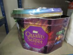 2Kg Tin of Quality Street, unused but has a big dent in the side of the tin
