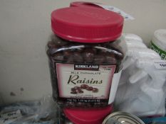1.53Kg tub of Kirkland Signature Milk Choclate raisins, BB 04/08/21