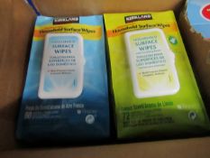 Box of Kirkland Signature Household surface wipes, the box contains 4 packs and in total across