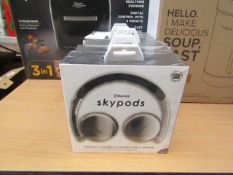 Skypods Bluetooth headphones, new and boxed.