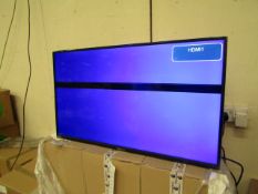 Hannspree 39.5" LCD monitor, tested working but has a line on the screen. Boxed.