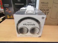 Skypods Bluetooth headphones, new and boxed.