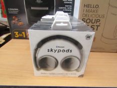 Skypods Bluetooth headphones, new and boxed.