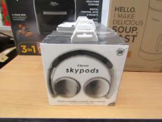 Skypods Bluetooth headphones, new and boxed.