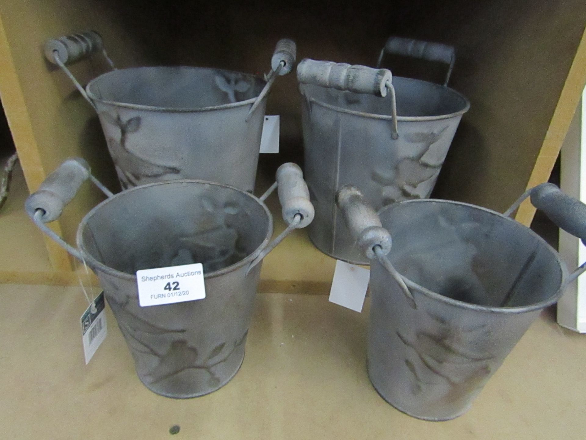 2x seets of 2 small ornate metal bucket planters