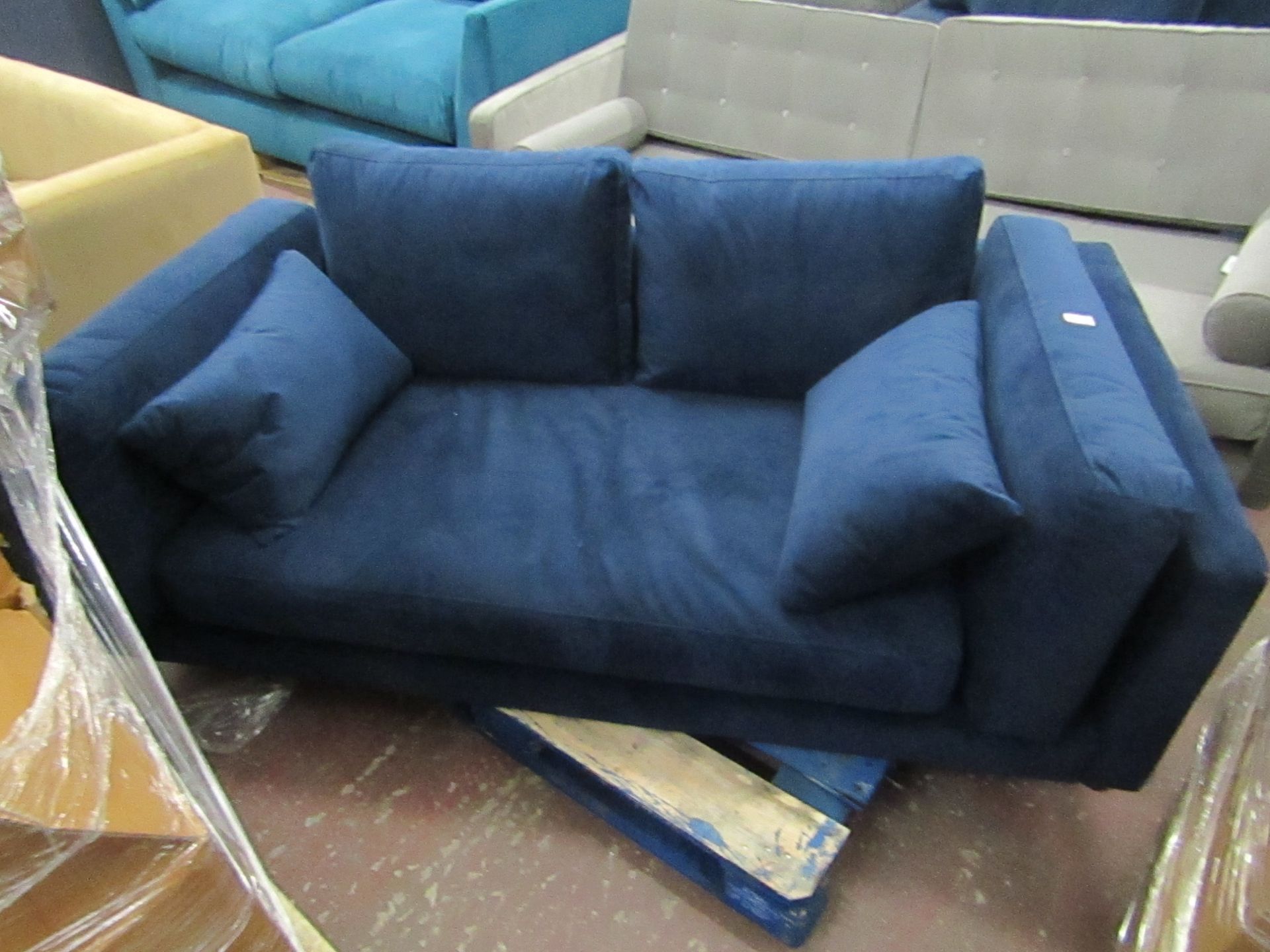 | 1x | SWOON BLUE VELOUR 2 SEATER SOFA, NO FEET AND NEEDS A CLEAN, 2 BITS OF DAMAGE TO ONE OF THE