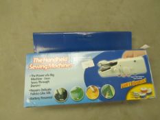 Handheld Sewing Machine. Boxed but untested