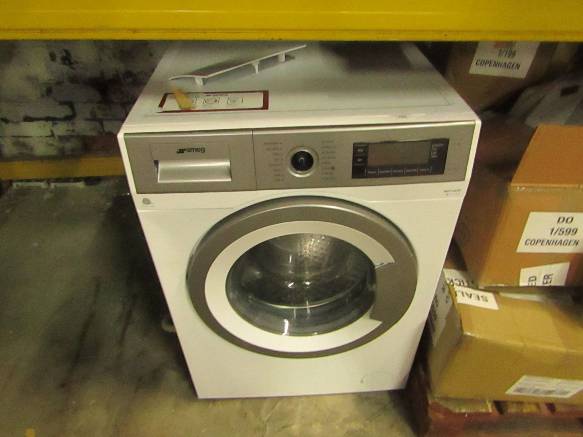 Smeg WHT1114LUK1 washing machine, powers on but knob is missing and does not appear to spin but we
