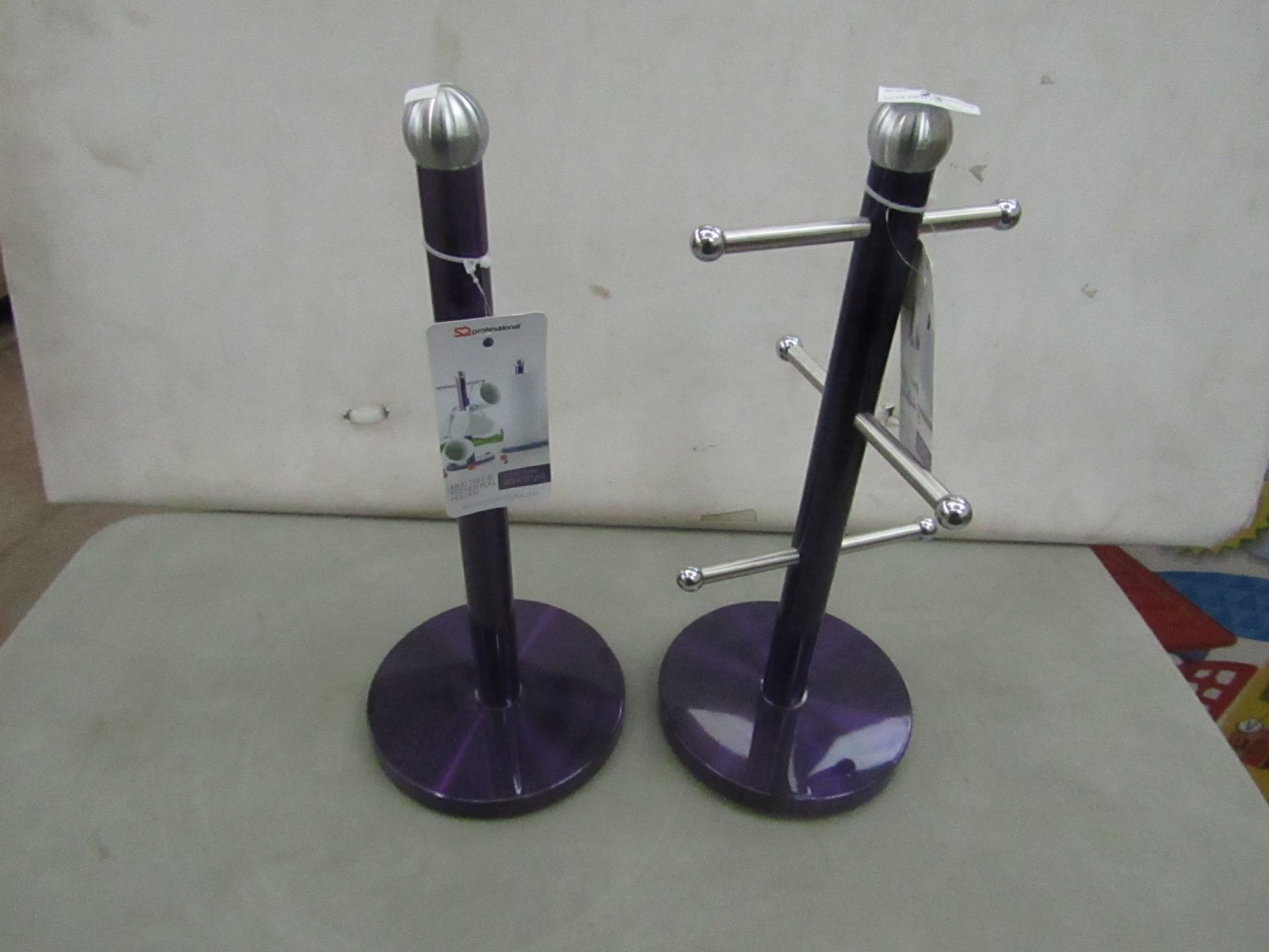 1x Purple Cup Holder -Unused With Original Tags. 1x Purple Kitchen Roll Holder - New With Original