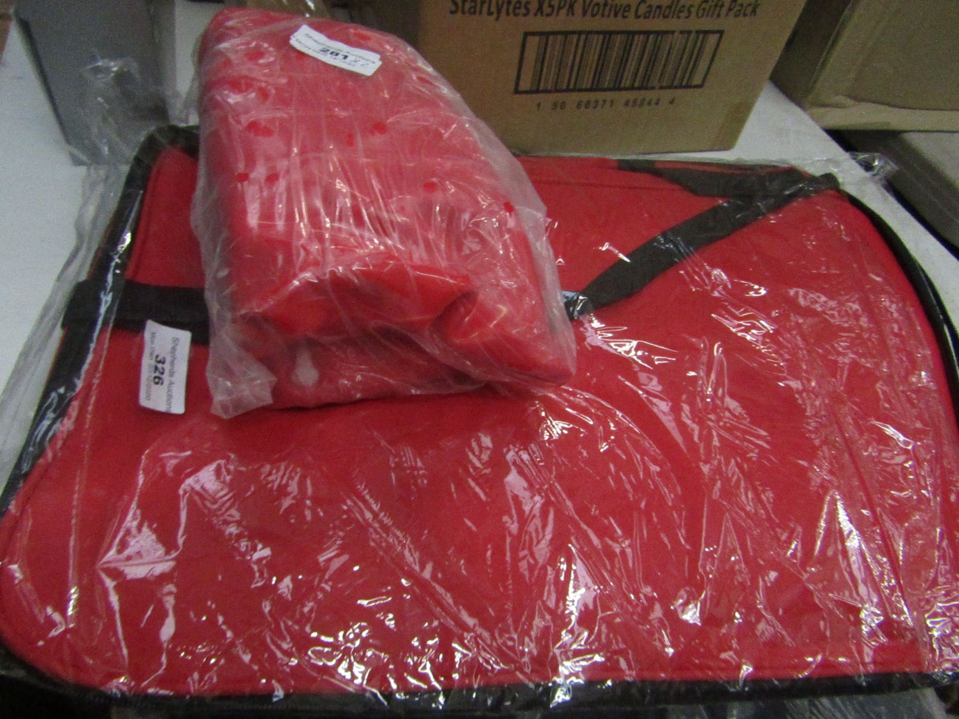 1x Red Gym Ball - Unused & Packaged. 1x Large Red Laptop Rucksack - Unused & Packaged.