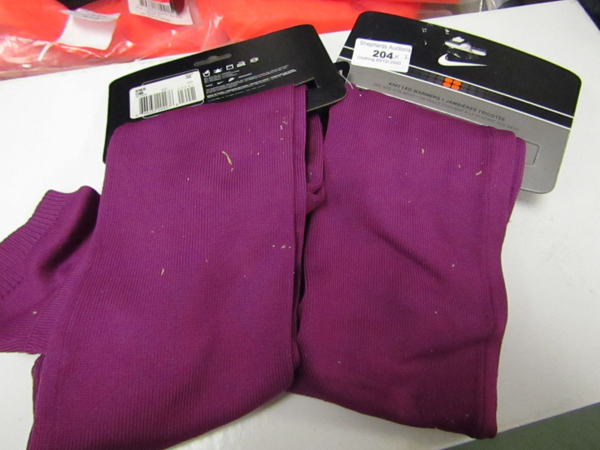 2 X Nike Knit Leg Warmers Ladies ( Appear to Have Bits Cardboard stuck to them but will come off