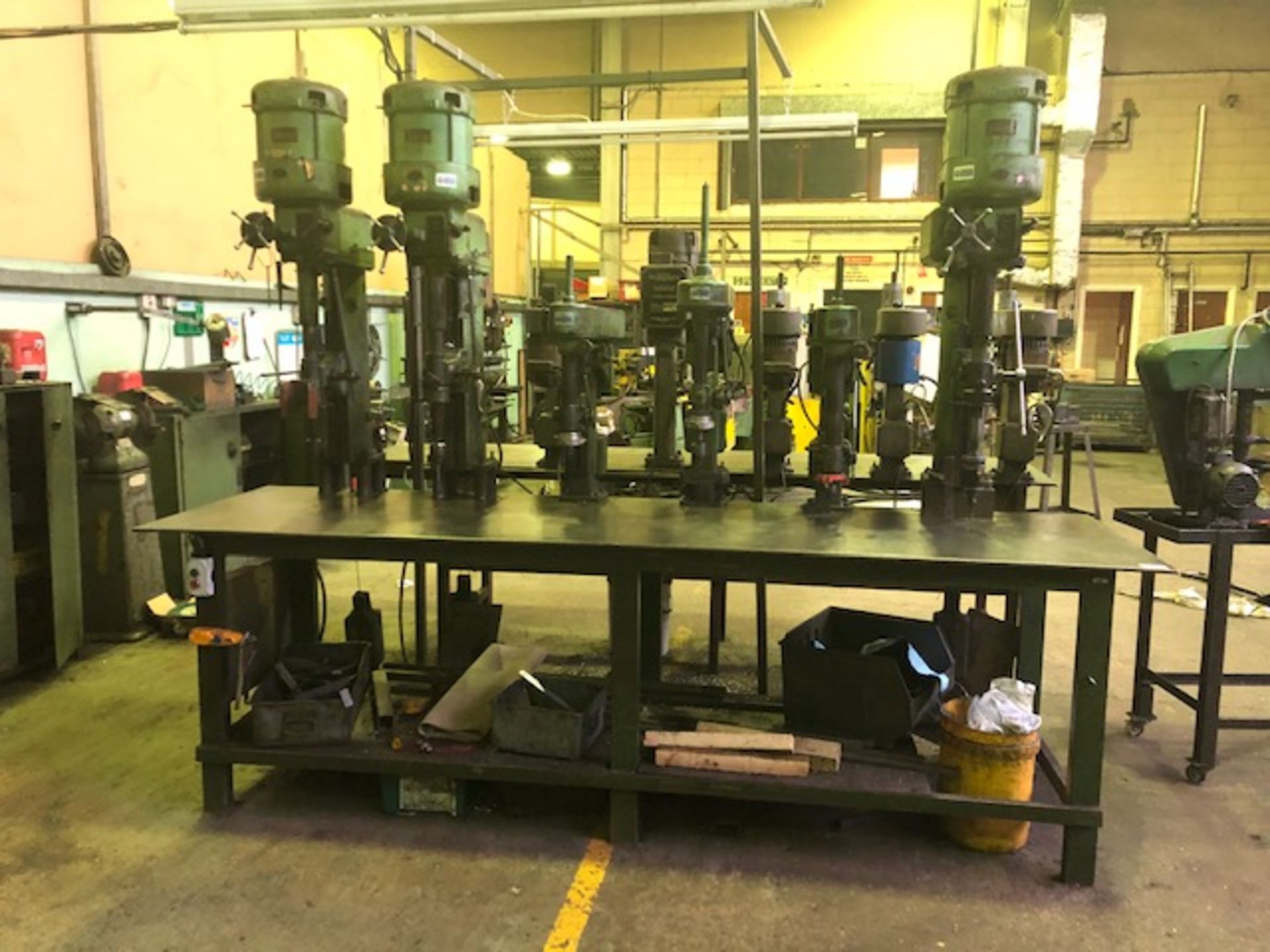 Steel drill bench with 6 Herbert overhead drill units