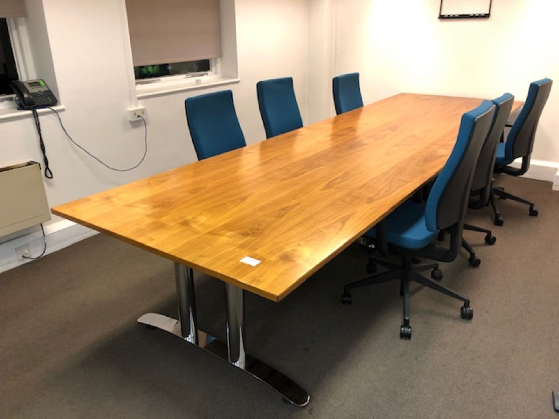 Two section beech & chrome base rectangular boardroom table with 6 blue cloth mobile swivel chairs