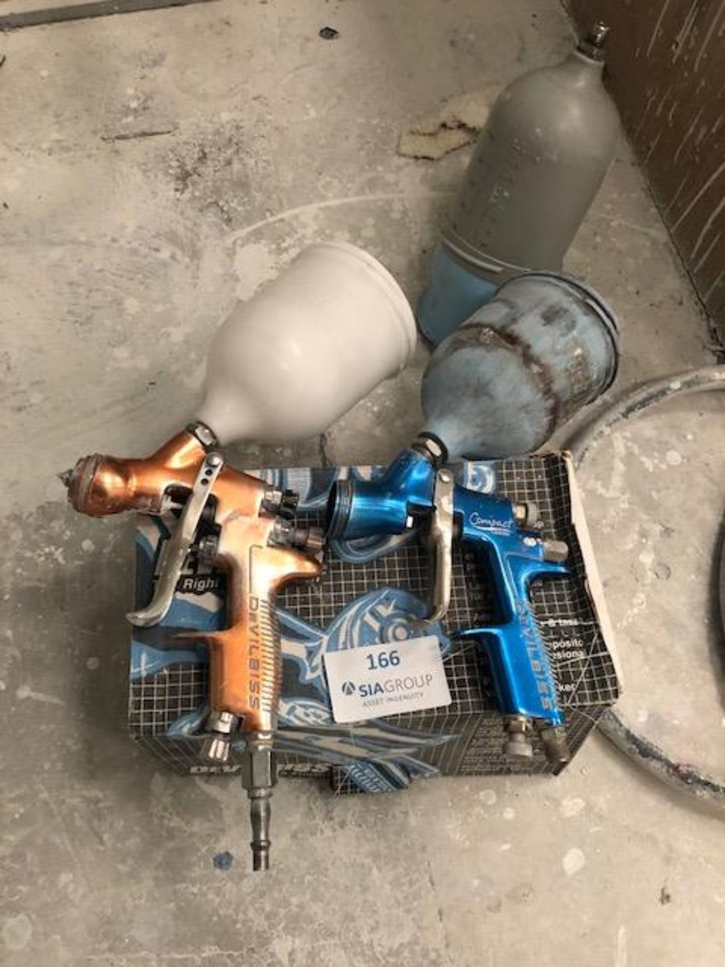 (2) DeVilbiss Professional Spray Guns with Quantity of Cups and Air Hoses